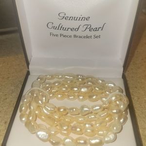 Pearl necklaces real? Costume?